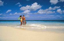 Couple Strolling on Beach